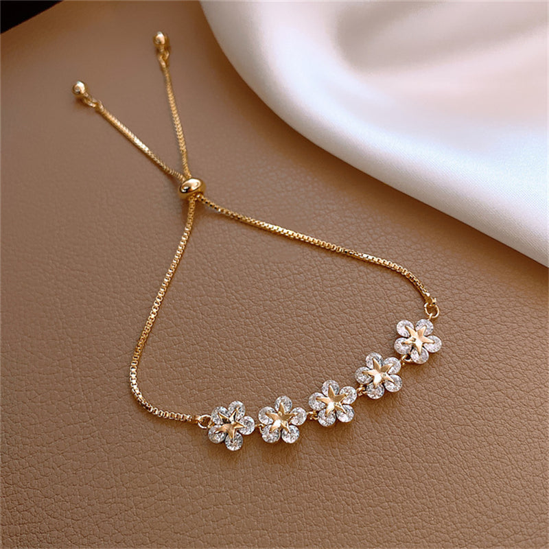 Verstellbares, 18 Karat vergoldetes Luxus-Armband mit funkelnden Blumen